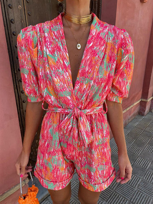 Unaly Jumpsuit - Voeg zomerse flair toe aan je garderobe met Unaly, een levendige korte jumpsuit met een ingebouwde riem voor een flatterende pasvorm. Perfect voor casual dagen, strandwandelingen en avondjes uit. Gemaakt van lichtgewicht polyester voor ultiem comfort. Verkrijgbaar in Pink en Purple, in maten XS-3XL. Combineer stijl en comfort moeiteloos met Unaly en straal bij elke gelegenheid. Bestel nu en geniet van de zomer in stijl!